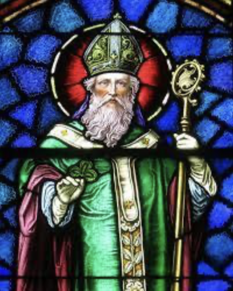 A stained glass image of St Patrick